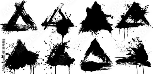 Abstract black ink splatter triangle shapes for minimalist design and tattoo concepts