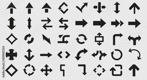 Collection of various black arrow symbols and directional icons with different shapes and orientations.