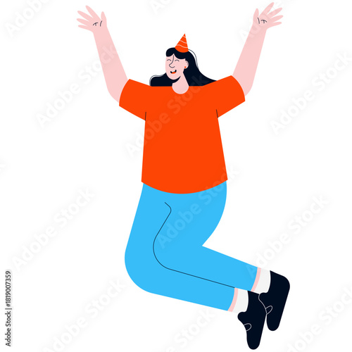 A joyful person with long dark hair wearing a party hat is jumping in the air with arms raised.