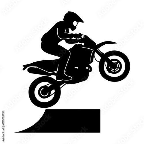 Silhouette of a motocross rider jumping off a ramp on a white background