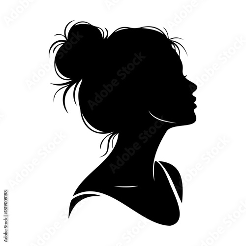 Silhouette of a woman with a bun hairstyle looking to the right side