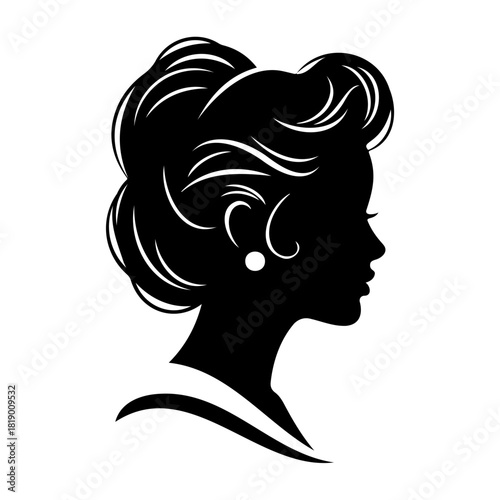 Silhouette of a woman with elegant updo and pearl earring in profile