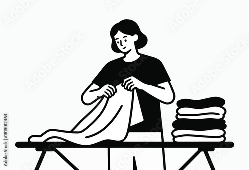 Black and white illustration of a person folding laundry on an ironing board, with a stack of folded clothes