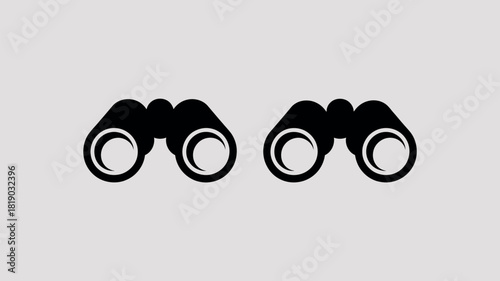 Silhouette of two black binoculars on a light gray background