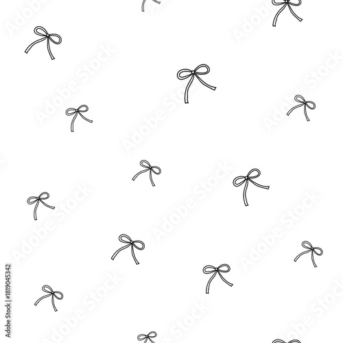 Simple and contemporary seamless design with only black bows on a white background, offering high contrast for modern, elegant applications.