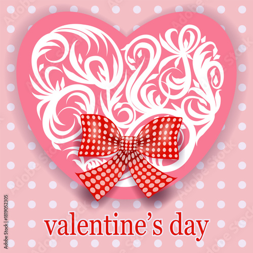 A lacy, patterned heart with a red bow, a Valentine's Day card