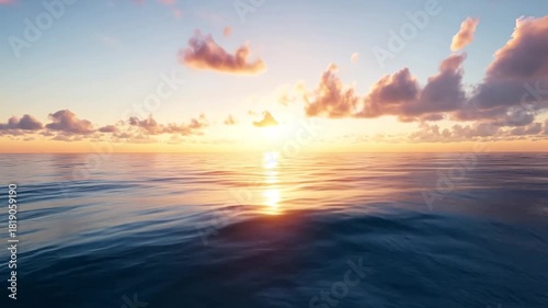 Sunset over tranquil ocean waves
