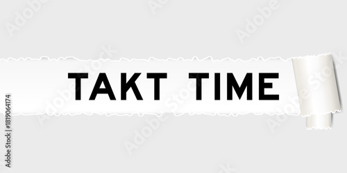 Ripped gray paper background that have word takt time under torn part