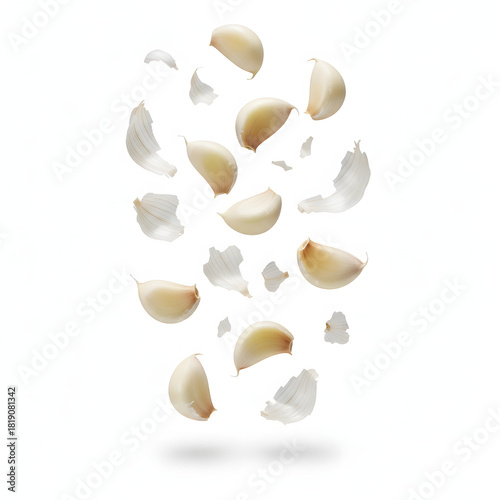 Garlic Cloves Falling with Flying Skin Isolated on White Background