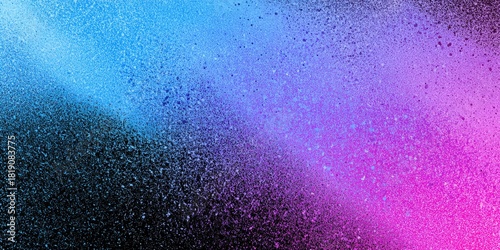 Colorful spray paint effect, gradient from blue to pink on a dark texture
