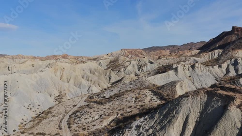 Cinematic Aerial View: The Arid, Dry Terrain of the Tabernas Desert, Andalusia, Illustrating Growing Desertification in Southern Spain