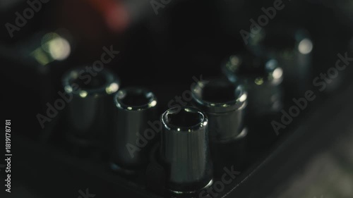 Macro Shot of Chrome Socket Set with Light Reflections