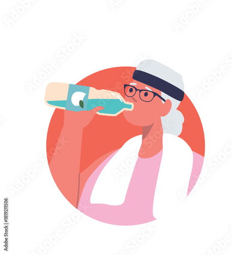 Sportive elderly woman drinking water