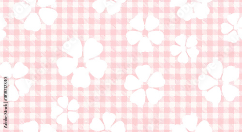 Delicate floral motif on a gingham pattern creating a soothing and inviting backdrop