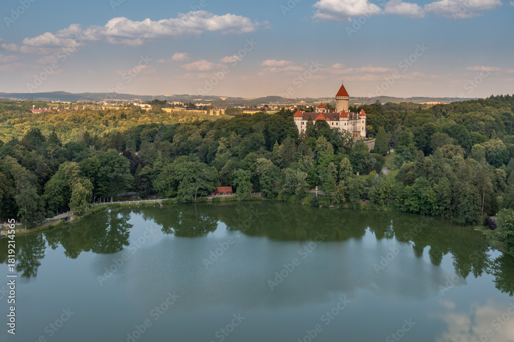 Naklejka premium view of Konopiste Castle with reflection on the lake surface