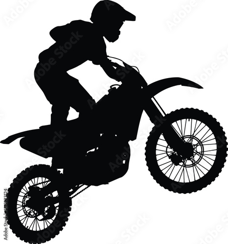 Motocross rider silhouette performing high jump on dirt bike, extreme sport action, off-road motorcycle stunt, helmet safety, dynamic outdoors competition