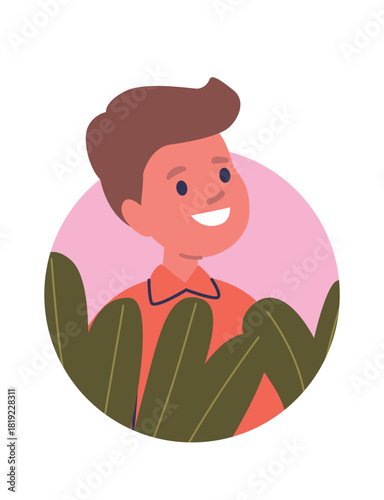 Schoolboy surrounded exotic leaves portrait