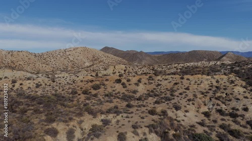 Cinematic Aerial View: The Arid, Dry Terrain of the Tabernas Desert, Andalusia, Illustrating Growing Desertification in Southern Spain