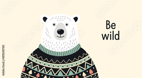 Cute illustration of a polar bear wearing a patterned sweater with the words 'Be wild' on a beige background.