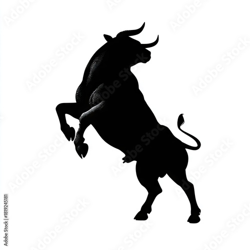 Black silhouette of a bull rearing up on hind legs isolated on white