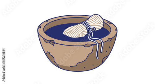 Rolled parchment being dyed in an old stone bowl.