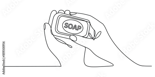 Continuous line art of hands holding soap, hygiene concept