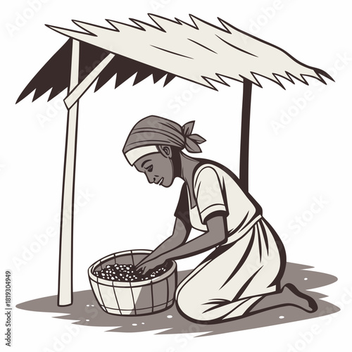A woman wearing a headscarf kneels under a thatched roof sorting small items in a basket