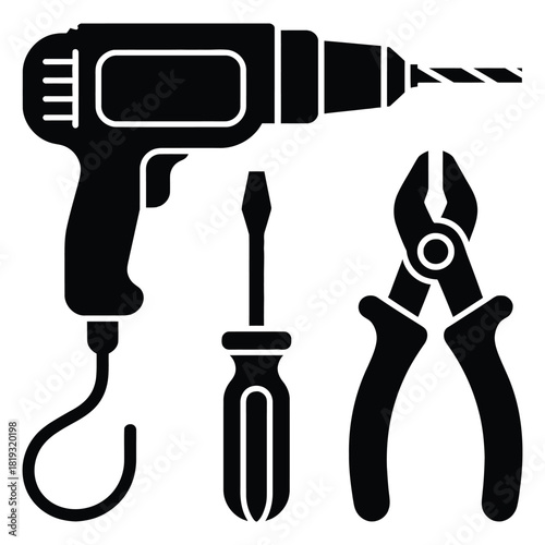 Handyman tools isolated on white background drill, screwdriver, and pliers for repair and construction tasks