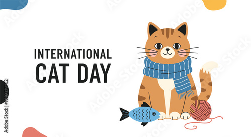 International cat day banner featuring a cute ginger tabby cat wearing a scarf with a toy fish and a ball of yarn.