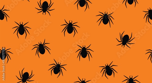 Seamless Halloween pattern of black spider silhouettes scattered on a bright orange background for festive holiday decoration.