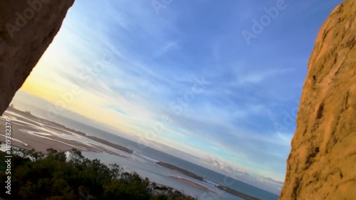 Coastal View Framed by Ancient Stone Gate, Oualidia, Morocco