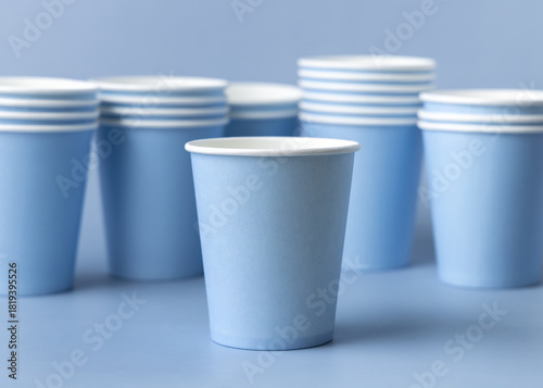 Wallpaper Mural Disposable light blue paper cups closeup, mockup, copy space. No plastic biodegradable single-use Torontodigital.ca