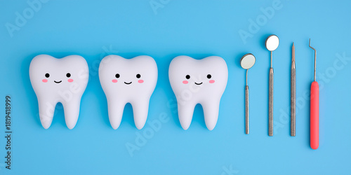 Cute cartoon teeth with happy faces next to metal dental tools on bright blue background for dental care or hygiene concept