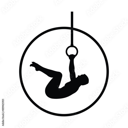Silhouette of gymnast performing on gymnastic rings isolated on