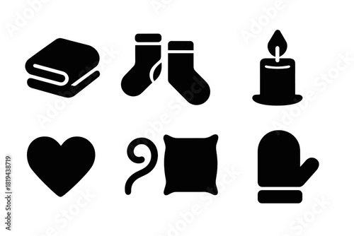 Fireside Comfort Icons. Fireside Comfort. Filled icon set of Fireside Comfort: blanket, socks, candle, mug,