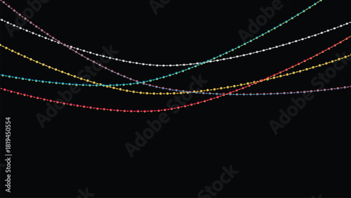 Colorful string of tiny festive lights or bunting hanging against a solid black background