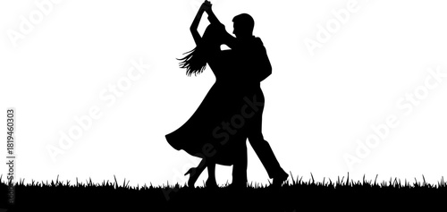 Joyful couple dancing gracefully outdoors amidst lush green grass capturing a moment of pure happiness and romantic connection