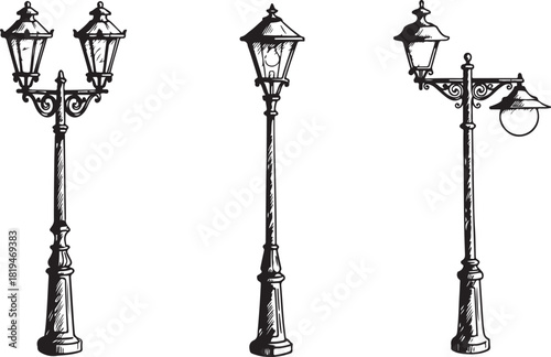 Vintage iron street lamp silhouette in town at night