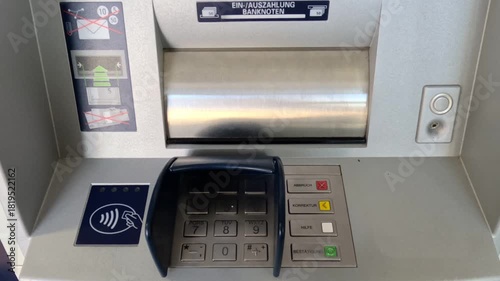 Morning cash withdrawal at an Automated Teller Machine in Germany