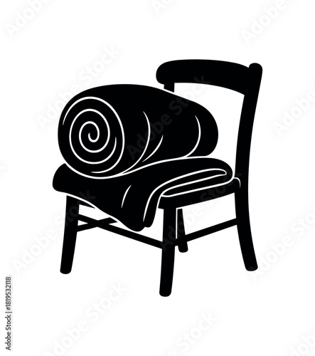 Blanket rolled on chair black silhouette with spiral and crease lines home comfort storage detail