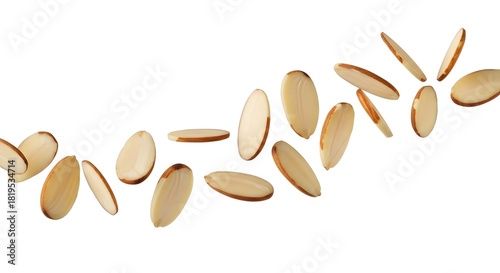 Almond sliced floating on white background perfect for representing healthy snack ingredient for salads baking or as protein source food 195