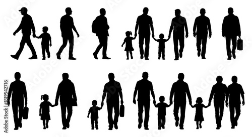 Silhouettes of Fathers and Children Walking Hand in Hand Together
