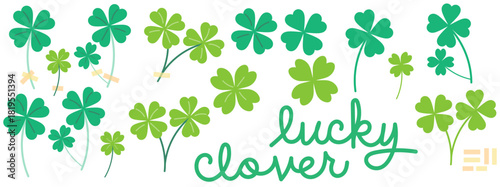 set of vector green four leaf clovers and silhouettes with transparent tape and cursive text of the words lucky clover