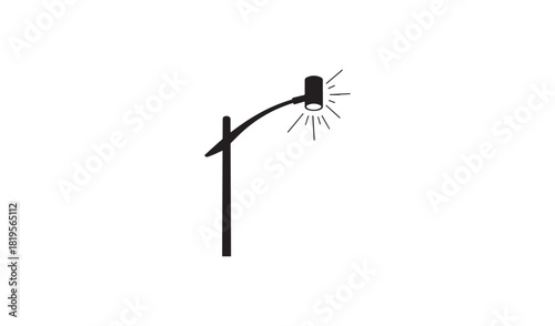 Simple silhouette of a streetlight with glowing bulb