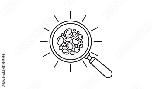Magnifying glass inspecting a cluster of cells or particles
