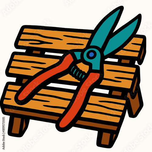 Garden scissors on wooden bench