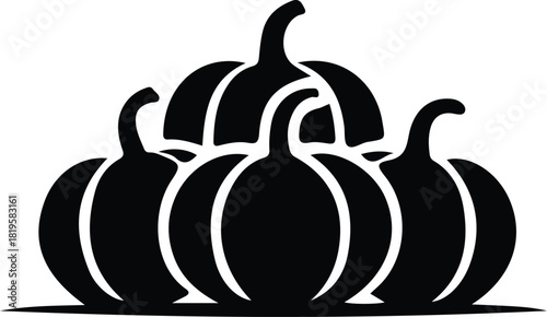 Black silhouette of a group of pumpkins in a pile