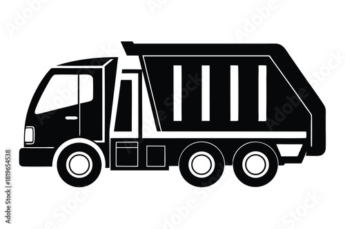 Silhouette of a black dump truck showcases its robust build and simple construction