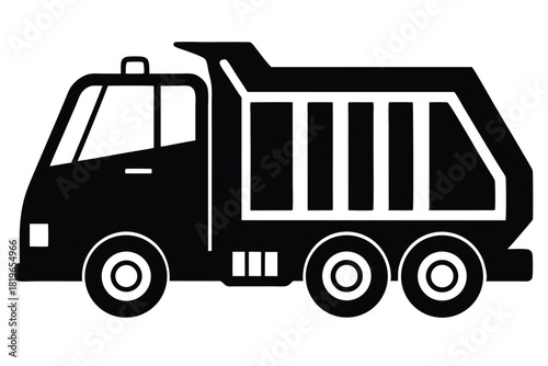 Black silhouette depicts a large truck with open construction trailer and three wheels