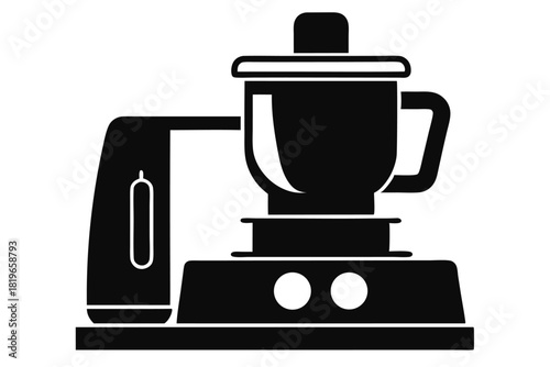 Black food processor with two white knobs stands prominently in this monochrome image